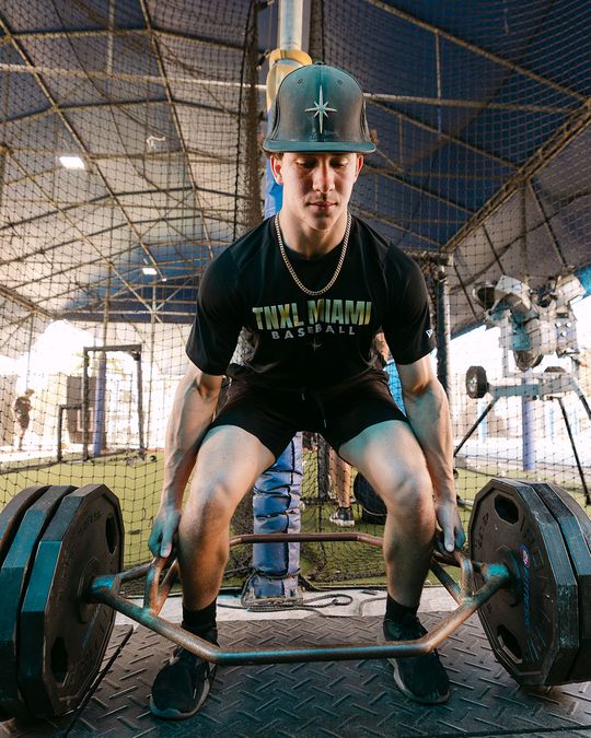 Athlete setting up a trap bar lift
